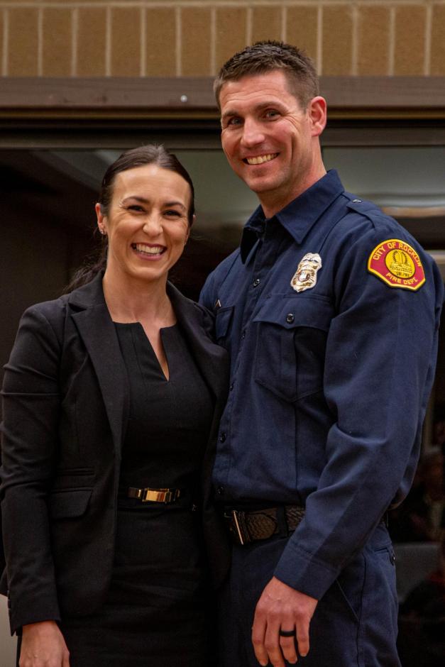 New Rocklin firefighter Erik Garside stands with his wife.